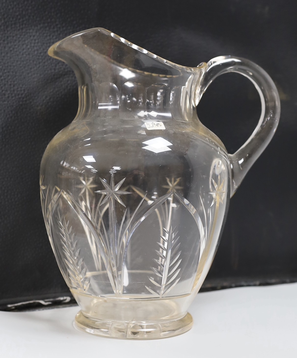 A Victorian/Edwardian cut glass toilet jug and basin